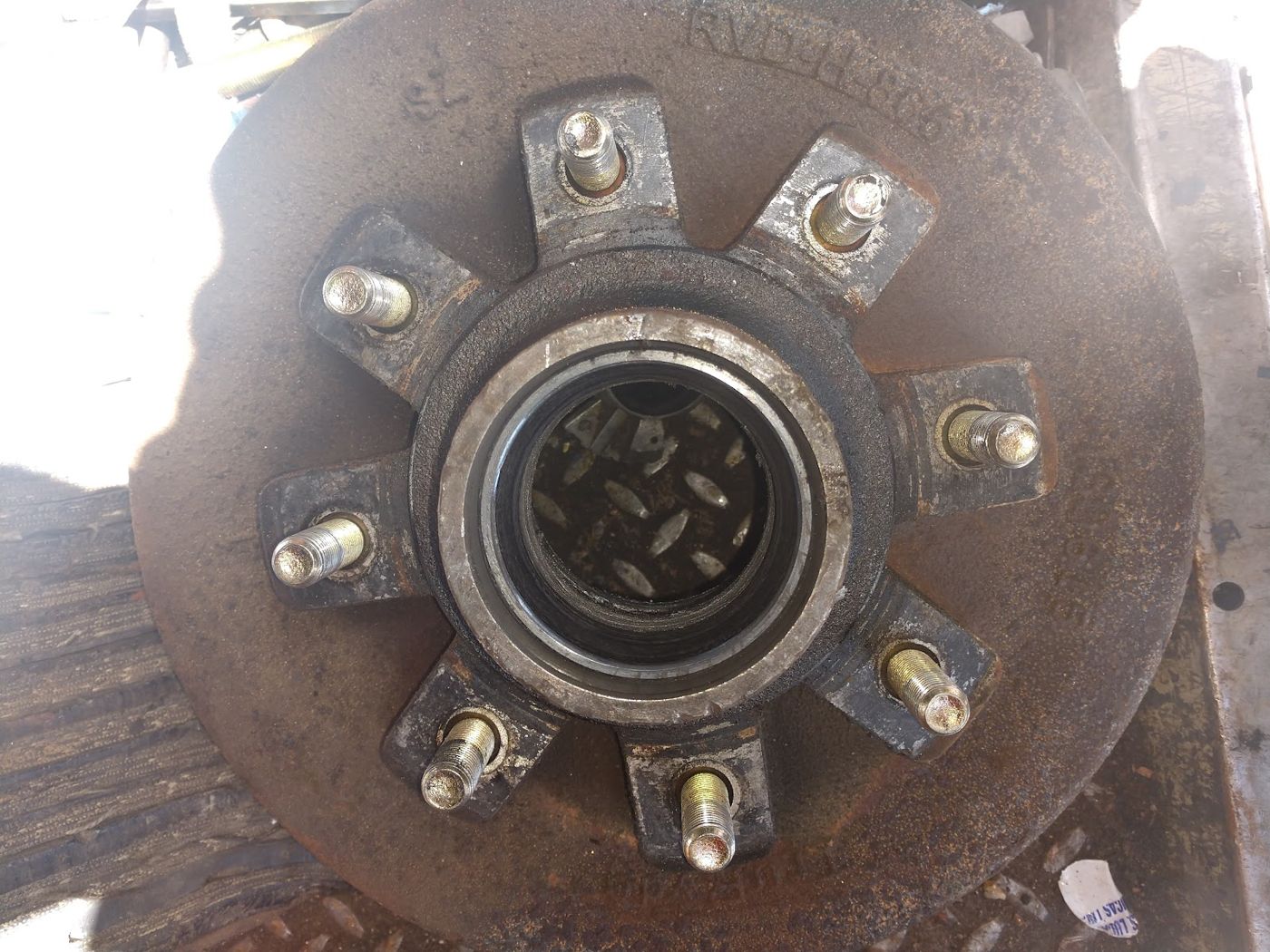 A trailer wheel hub with the bearing cap removed
